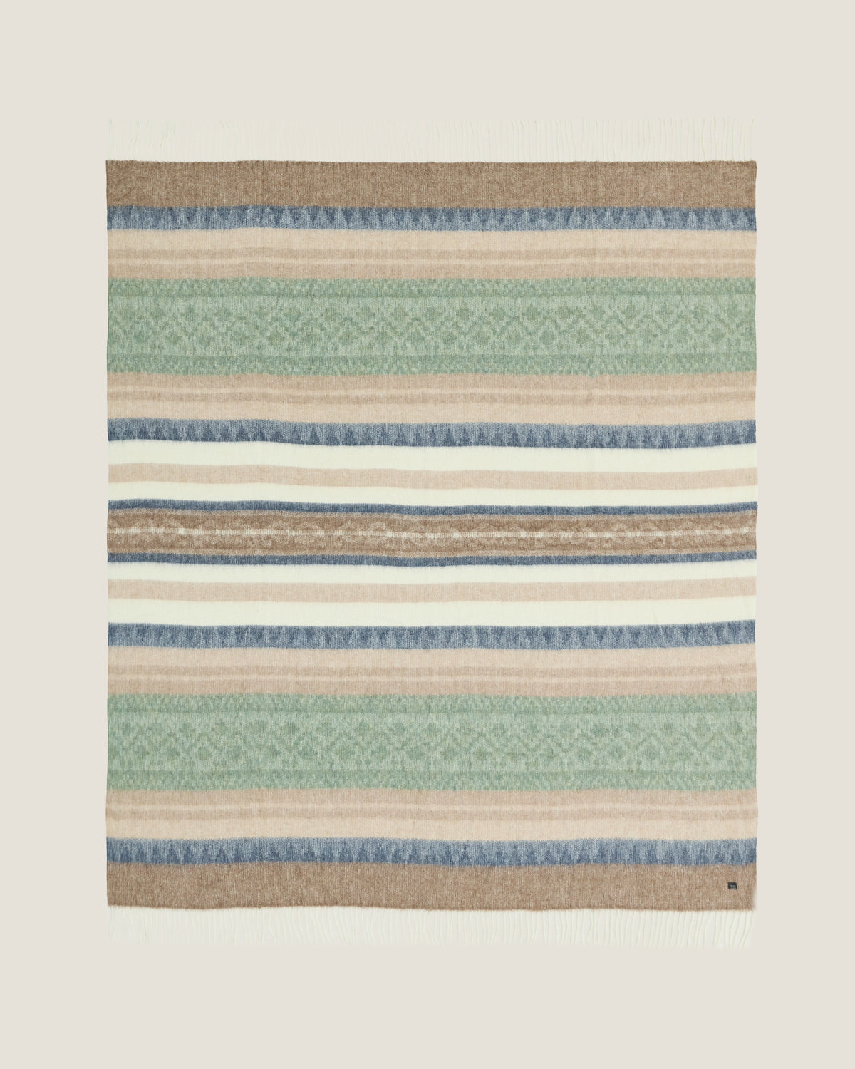 Alpaca Wool Throw Coastal Sage, a throw woven in Peru from alpaca and recycled wool in a soft grey-green