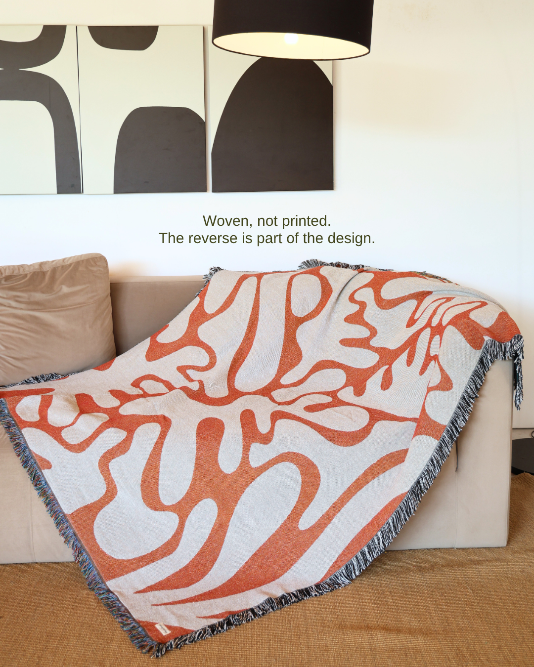 Wildform Clay blanket on sofa – woven, not printed