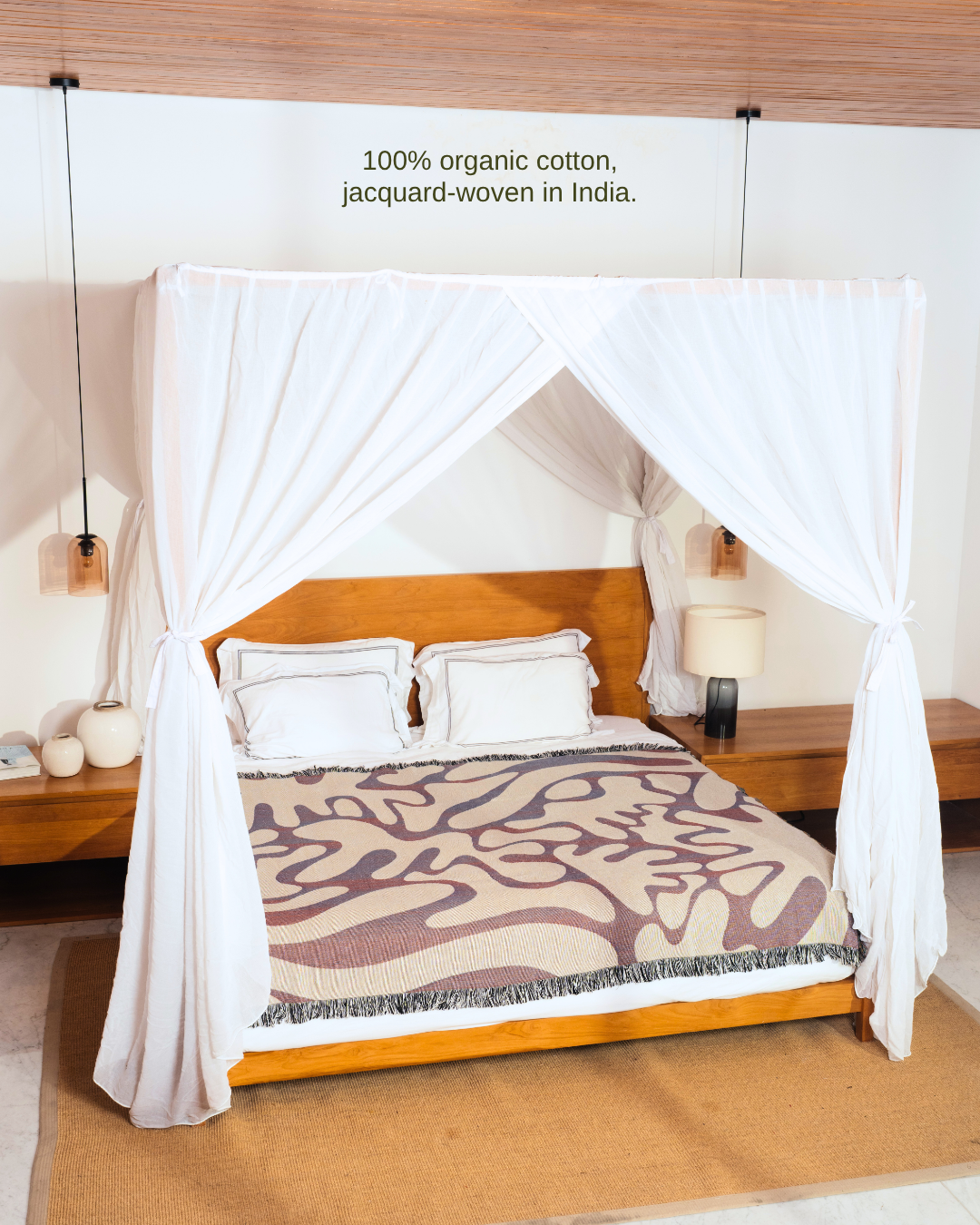 Wildform Rosewood blanket on canopy bed – 100% organic cotton