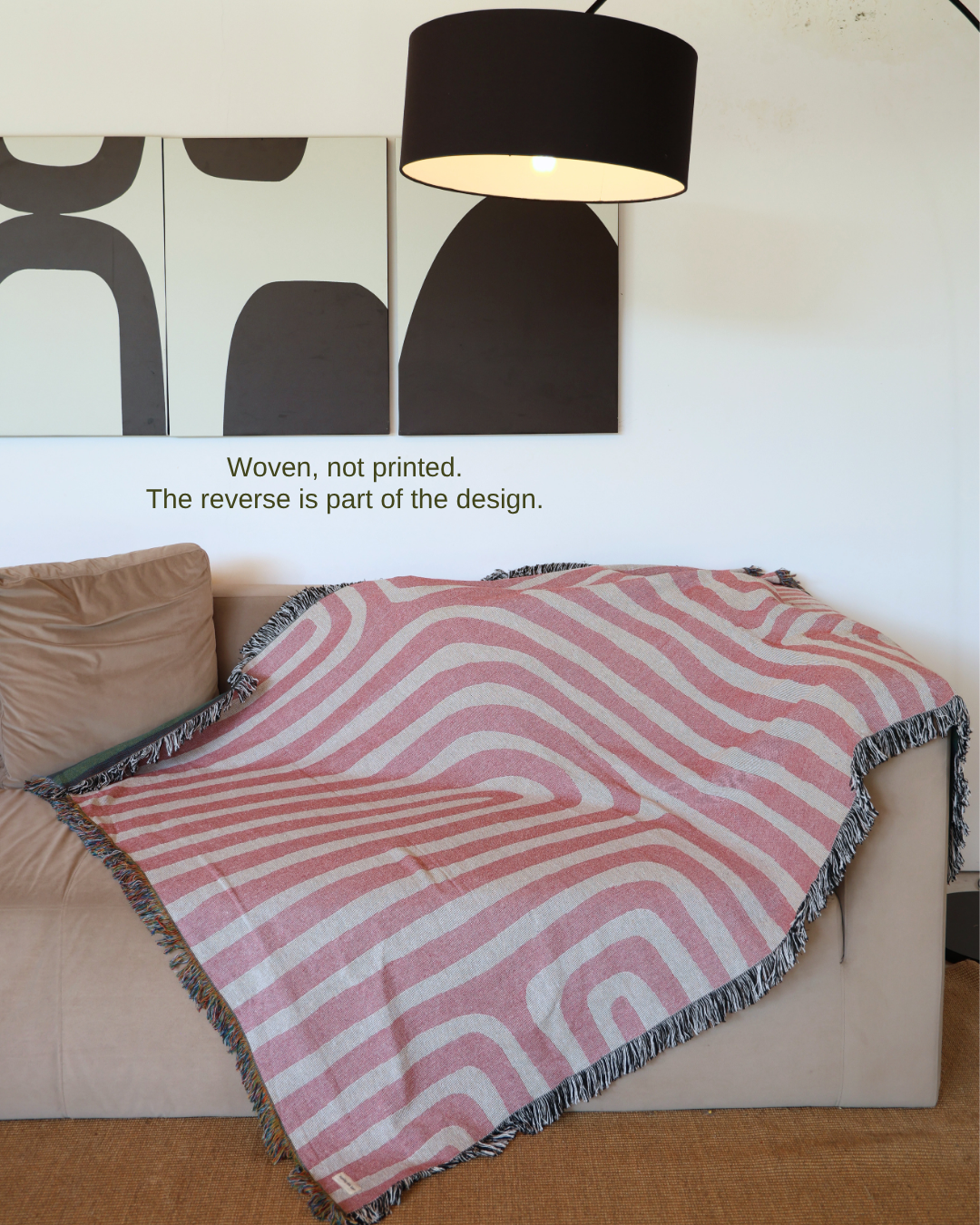 Contour Blush blanket on sofa – woven, not printed