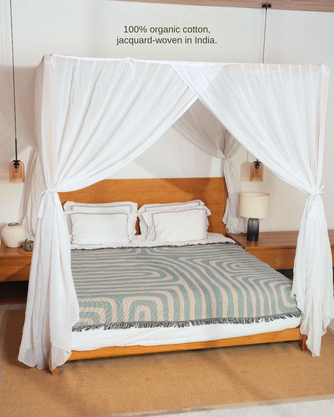 Contour Sky blanket on canopy bed – 100% organic cotton, jacquard-woven in India