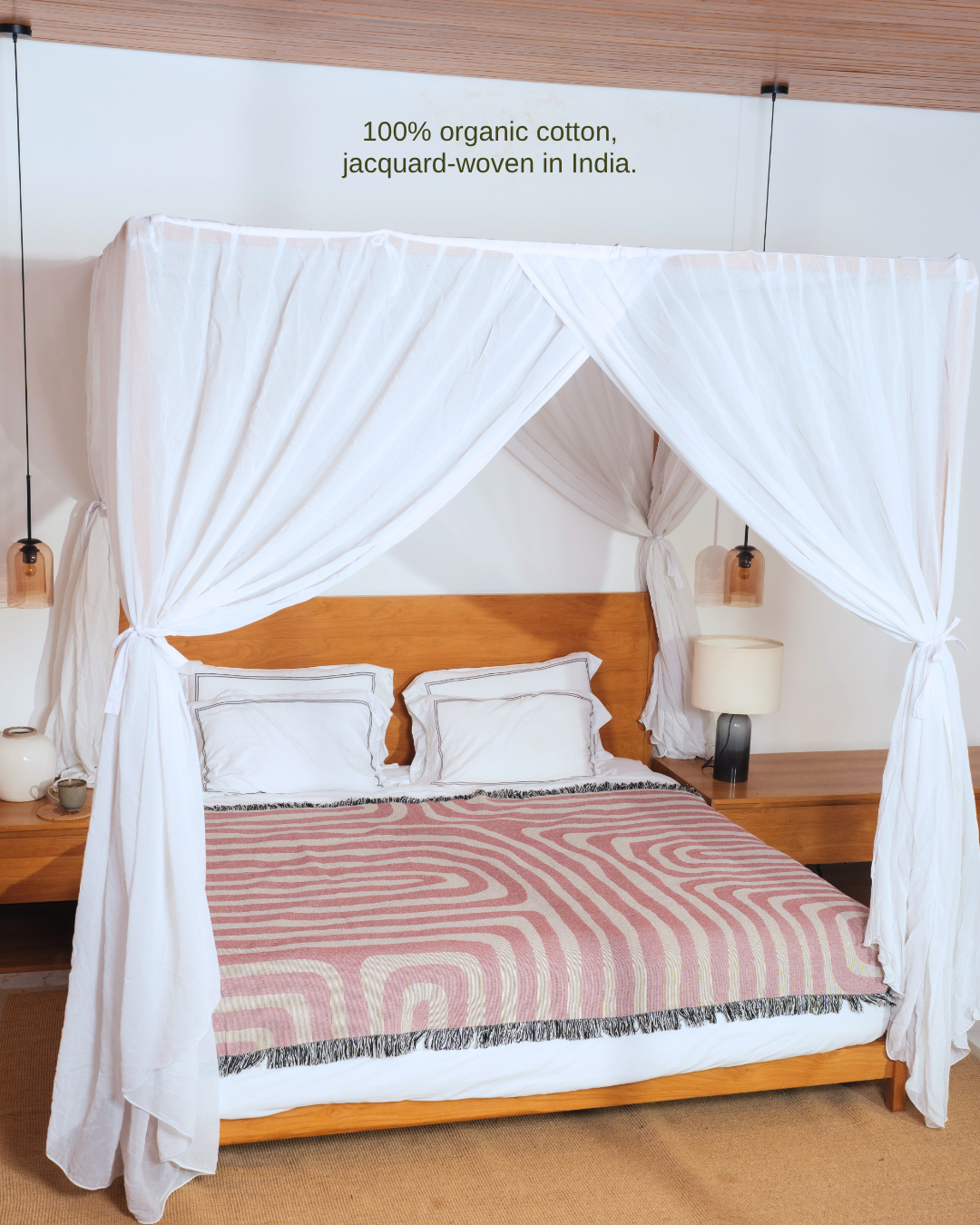 Contour Blush blanket on canopy bed – 100% organic cotton, jacquard-woven in India