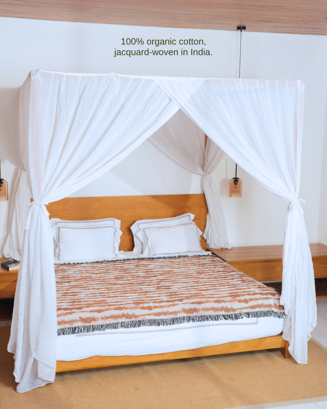 Drift Earth blanket on canopy bed – 100% organic cotton, jacquard-woven in India