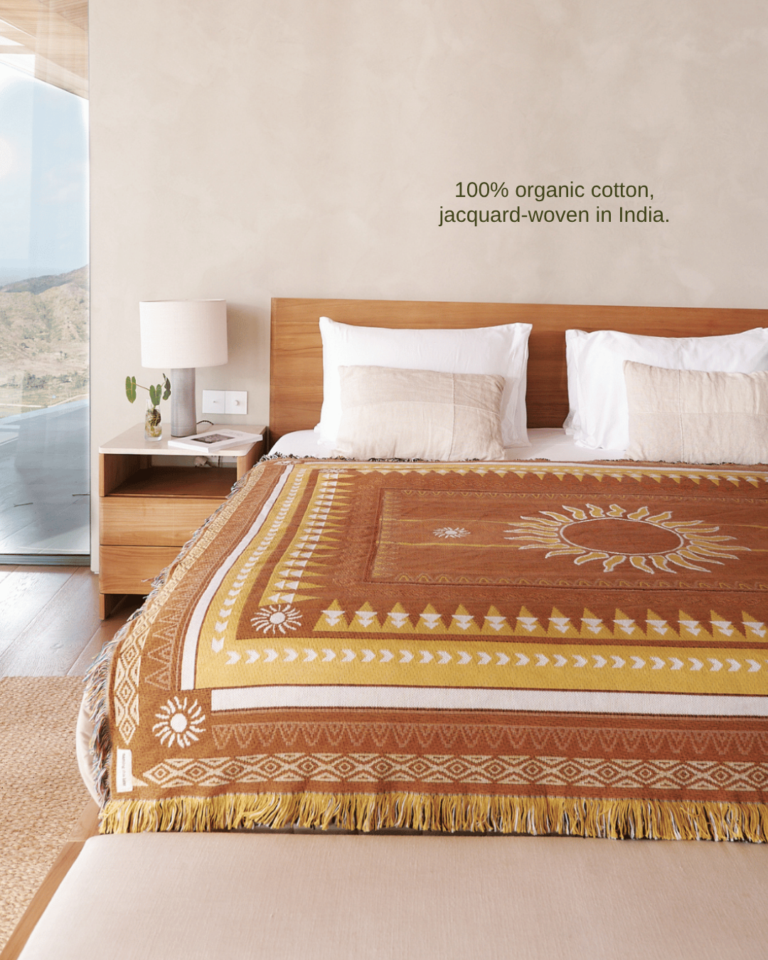 Sunset Brown blanket on bed – 100% organic cotton