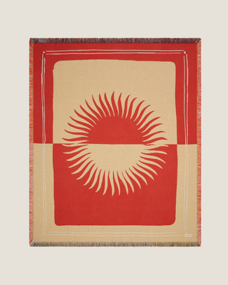 Red blankets and textiles by Naming This Later